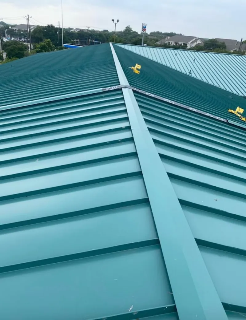 Green commercial metal roof ridge and valley for Metal Roof Repair in Roanoke